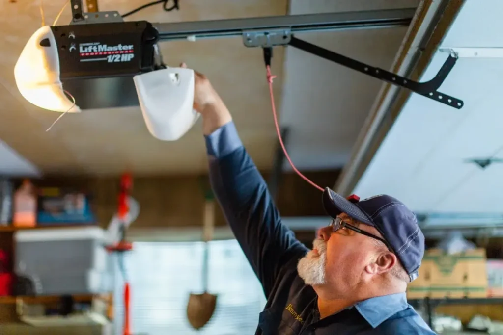 Worker Installing Garage Opener